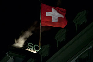 Schweizerhofquai, Luzern/Lucerne; Swiss flag, installation art, Hotel Schweizerhof; night